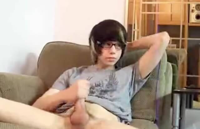 Twink with glasses wanks his huge uncut cock 5