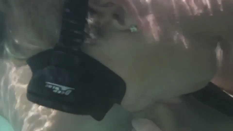 Boy sucking cock under water