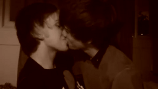 Teen boys kissing