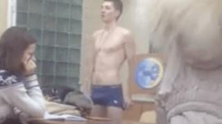Russian boy strips naked at school in class