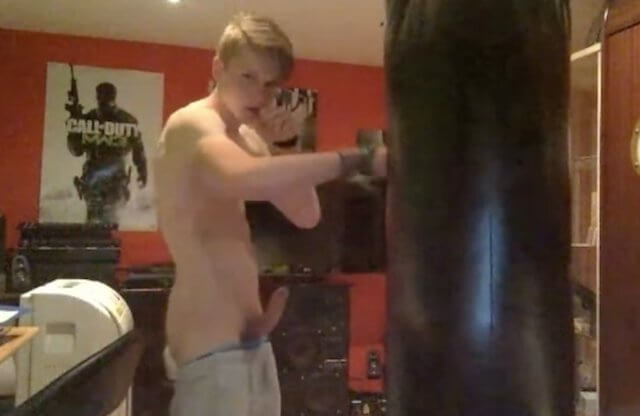 Boxer teen boy wanking and humping punching bag on cam