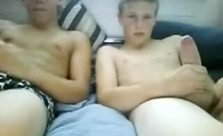 Teen buddies wanking together on cam
