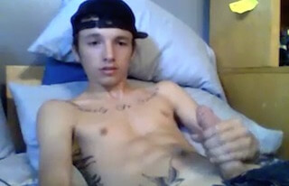 Young tattoo twink masturbating on cam