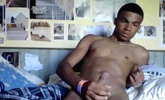Cute black twink jerking off and busting a nut
