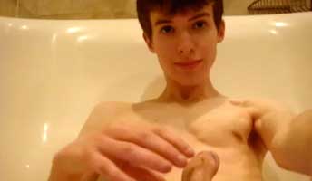Sweet twink jerks off and cums in the bath tub