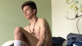 Horny Colombian boy strips naked in bed and jerks off